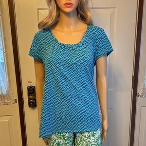 Short sleeve w/scoop neck an updated look done in a bold blue with black print